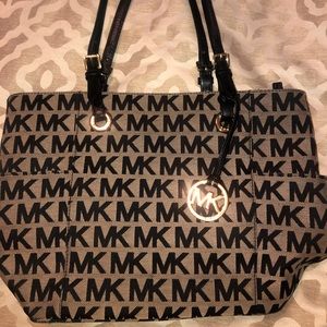 Michael Kors purse. Barley used.
